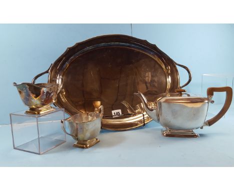 A GOOD QUALITY EARLY 20TH CENTURY SILVER PLATED FOUR PIECE TEA SET comprising:- Teapot, cream jug, sugar basin and matching o