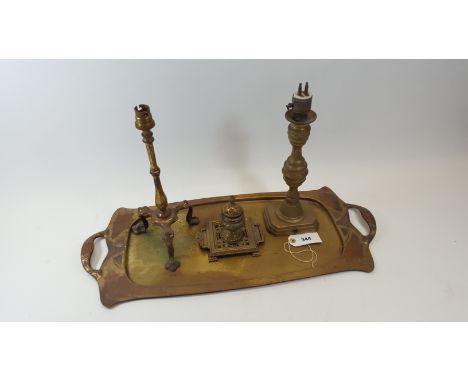 AN ART NOUVEAU BRASS SPOT HAMMERED DOUBLE HANDLED TRAY, 25 ins x 10 1/2 ins, a brass Pullman type TABLE LAMP, an Edwardian br