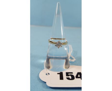 A LADY'S 14CT YELLOW GOLD BRILLIANT CUT SOLITAIRE DIAMOND RING, size P, approximately 0.60ct.   