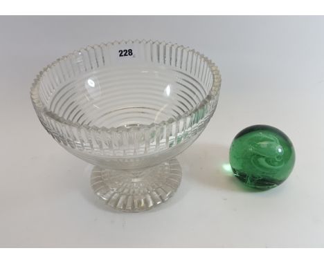 A 19TH CENTURY STEP-CUT FRUIT BOWL on a circular star-cut foot ring, 9 1/2 ins high (small rim chip) and a 19th Century green