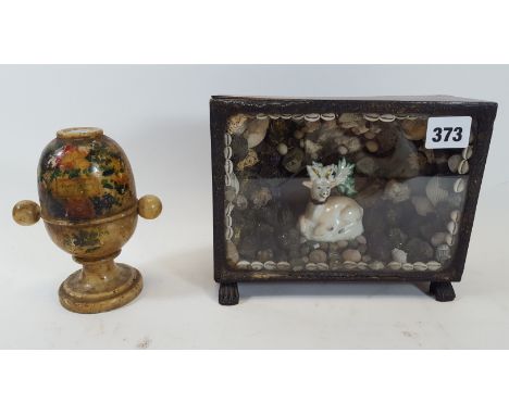 A 19TH CENTURY ROSEWOOD VENEERED GLAZED FRONT CASED GROTTO containing a ceramic deer in a shell and iron pyrite surround, rai