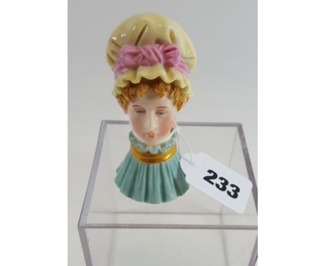 A LATE 19TH CENTURY ROYAL WORCESTER PORCELAIN CANDLE SNUFFER, "THE MOB CAP" inspired by Kate Greenaway, Circa 1890.   
