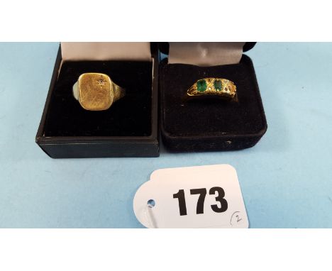 A 9CT YELLOW GOLD SIGNET RING (approximately 3 grams) and a lady's yellow gold emerald and diamond RING (lacks one emerald), 