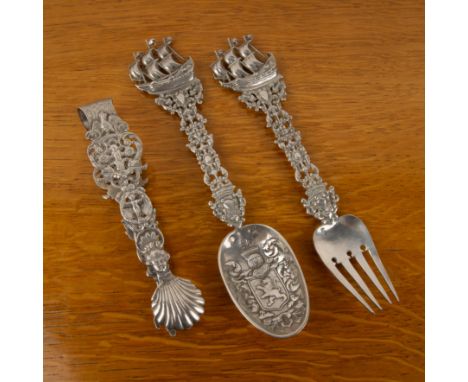 Collection of Continental (Possibly Dutch) silver items comprising a pair of tongs, with shell bowls, with cast and engraved 