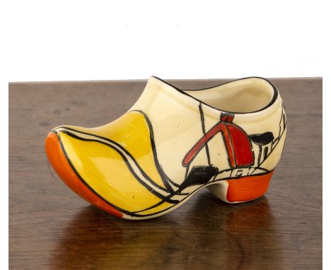 Clarice Cliff (1899-1972)'House and bridge', model of a clog, marked to the base, 6cm high x 10.5cm overall  With damage, rep