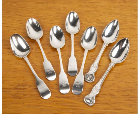 Collection of Irish silver spoons comprising: a set of five Georgian silver fiddle pattern spoons, each with engraved lion to
