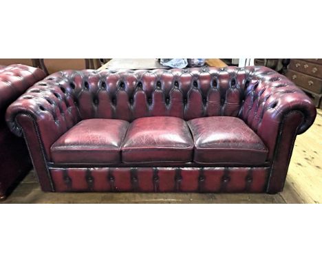 A Chesterfield style red leather sofa, 180 cm wide 
