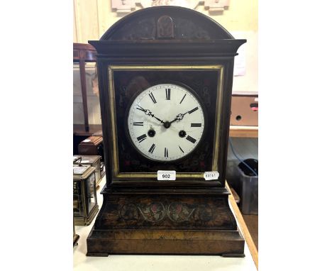 A 19th century German cuckoo clock, the enamel dial with Roman numerals, fitted a twin fusee movement, in a walnut case, 49 c