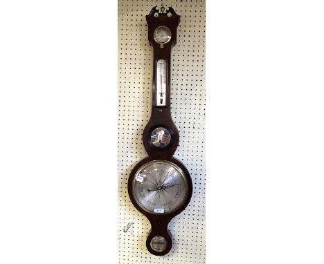 A mahogany wheel barometer 