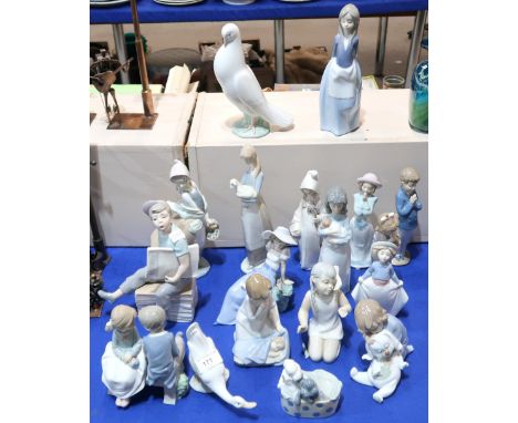 A collection of Lladro and Nao figures etc Condition Report:Available upon request