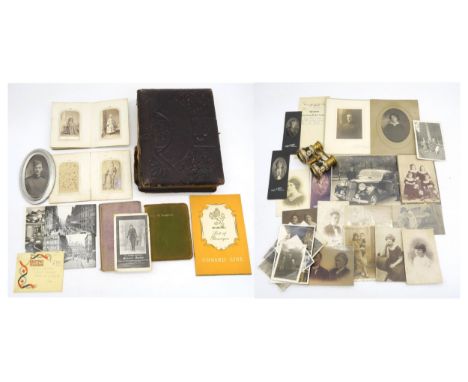 An embossed leather photograph album, with additional loose photographs to include an oval-framed portrait of a WW1 R.F.C. of