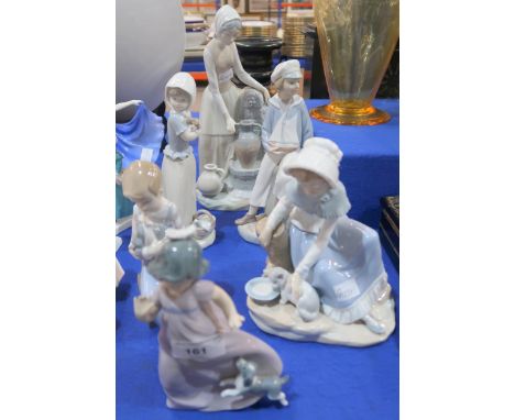 A collection of Lladro and Nao figures Condition Report:Available upon request