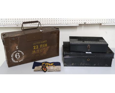 A lot comprising British metal bound ammunition case, special constable and fire guard armbands, military cap badge and two m