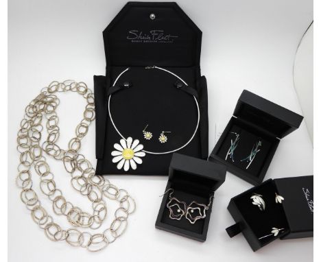 A large silver Sheila Fleet 'Daisy' necklace and earrings set, together with a 'Snowdrops' ring and earring set, 'Tidal' earr