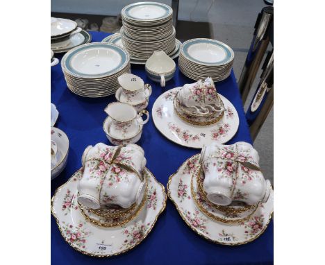 A Royal Albert Cottage Garden teaset compriisng ten cups and saucers, twelve plates, two jugs and sugar bowls, two cake plate