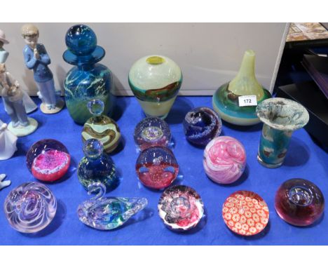 A collection of Mdina glass vases and weights and Caithness and other paperweights Condition Report:Available upon request