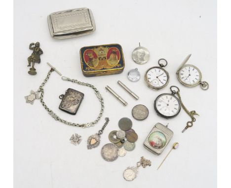 A silver vesta case by Albert Jackson, Birmingham, 1913, three various Birmingham silver fob medals (one being suspended from