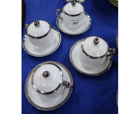 A set of four Georg Jensen chocolate pots with covers and saucers Condition Report:Available upon request