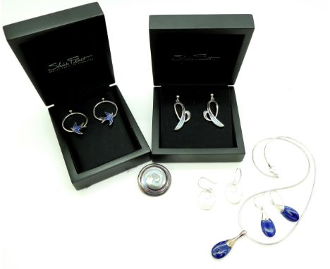 A pair of silver and enamel Sheila Fleet 'Swallow' earrings, a pair of 'Scapa Flow' earrings, a further enamelled swirl brooc