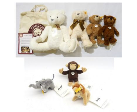 A collection of modern Steiff, comprising a 2011 Creme Cosy bear, smaller Charly and Happy bears and lion, monkey and elephan
