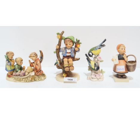 Three Hummel figures including a nativity candleholder and a Goebel bird group Condition Report:Available upon request