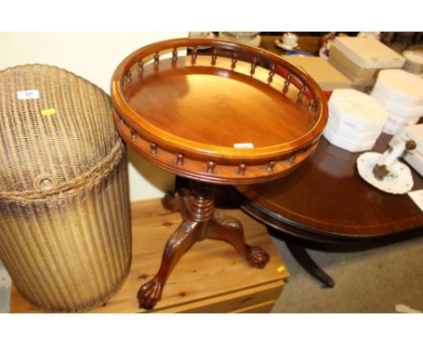 A reproduction mahogany tray top occasional table