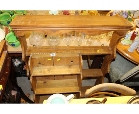 A stripped pine plate rack; and a pine wall shelf 