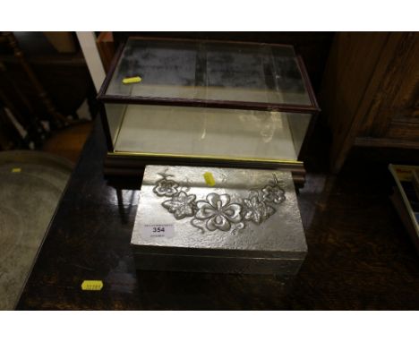 A pewter trinket box; and a small glass display box 