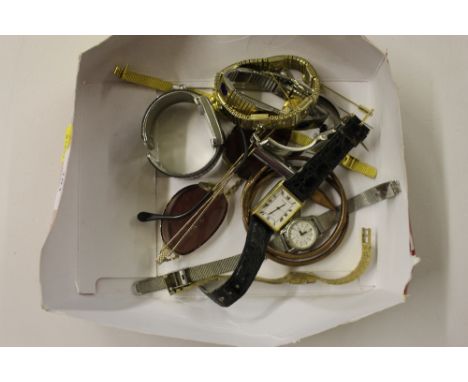 A tray of wrist watches, sunglasses etc.