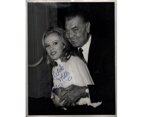 Hayley Mills, English actress. A vintage signed and dedicated 10x8 photo, in an embrace with boxer Jack Dempsey. She began he