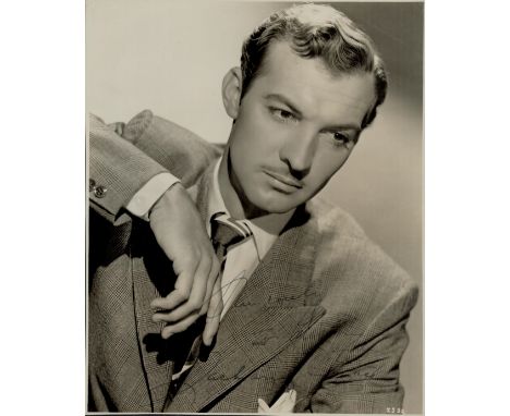 Zachary Scott signed vintage Black and White Photo 10x8 Inch. Was an American actor who was known for his roles as villains a