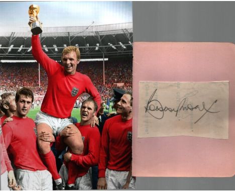Bobby Moore Signed Vintage Album Page With England 1966 World Cup Photo. Good Condition. All autographs come with a Certifica