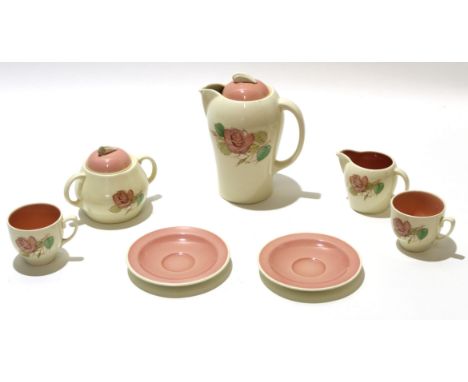 Group of Susie Cooper wares comprising a coffee pot and cover, sugar bowl and milk jug, 2 cups and saucers in kestrel shape, 