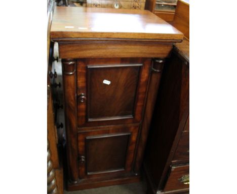 19th century mahogany pot cupboard of square form, trunk fitted with two panelled doors enclosing plain compartments, 40cm wi