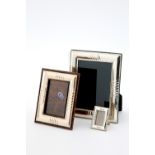 Three silver photo frames