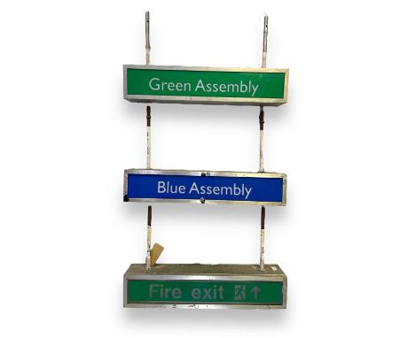 Three hanging signs with original fittings 'Green Assembly' 'Blue Assembly' 'Fire Escape'. Collection or courier only. Light 