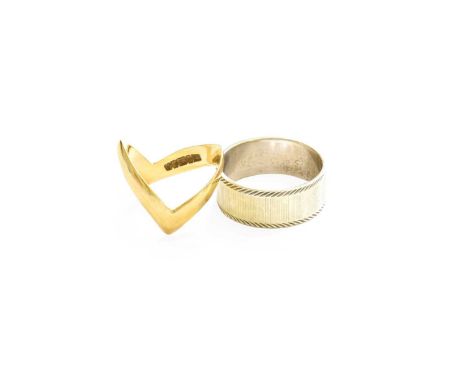 A 9 Carat White Gold band Ring, finger size Q; and A 9 Carat Gold Wishbone Ring, finger size N1/2Gross weight 7.1 grams.