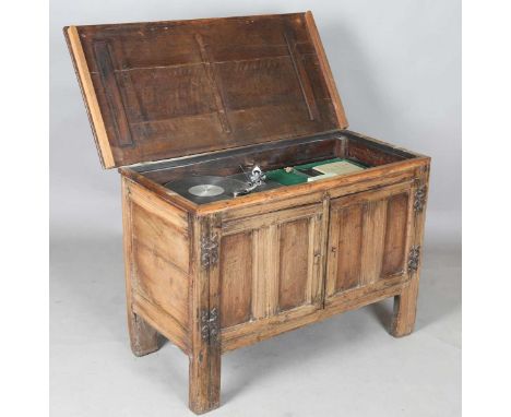 A Garrard 401 transcription motor and turntable with an SME model 3009 arm, later housed within an oak coffer, together with 
