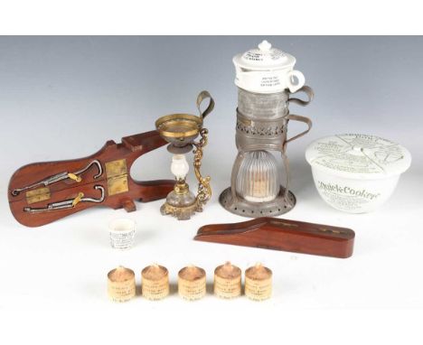 An early 20th century Saml Clarke's 'Pyramid Food Warmer', formed from ceramic and tin stacking sections, height 30cm, togeth