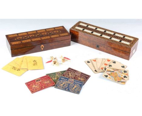 A Victorian Tunbridge ware games box with cribbage board lid, the interior with four gilt-tooled leather bezique markers and 