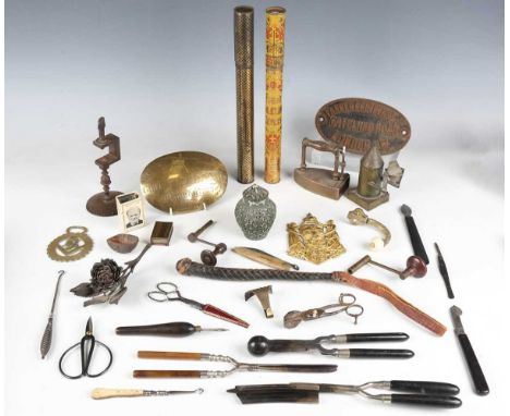 A mixed group of collectors' and metalwork items, including an 18th century steel needlework clamp, two tin taper cases and a