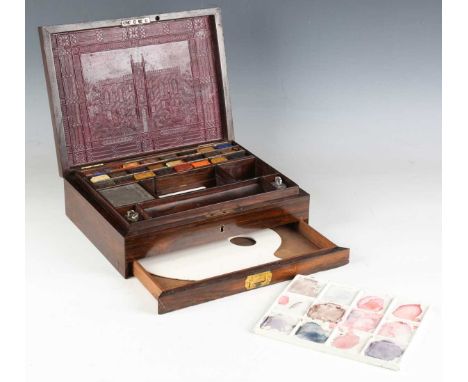 A Victorian rosewood cased artist's box by Newman's Manufactory, the top inlaid in mother-of-pearl and inset with an embossed