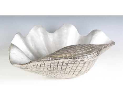A late 20th century cast metal basin of clam shell form, width 65cm.