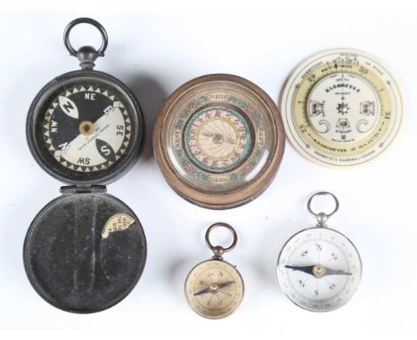 A 19th century treen cased compass with lithograph printed dial, diameter 6.5cm, three other compasses and a Negretti &amp; Z
