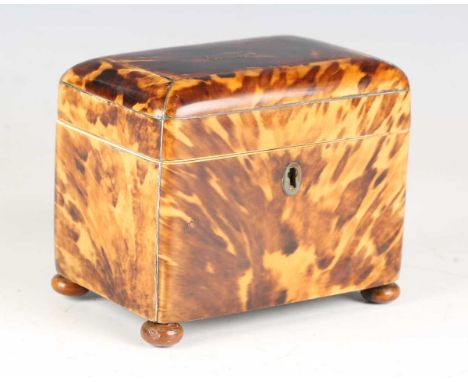 A Regency tortoiseshell tea caddy with white metal stringing and turned bun feet, width 13cm. Note: a non-transferrable ivory