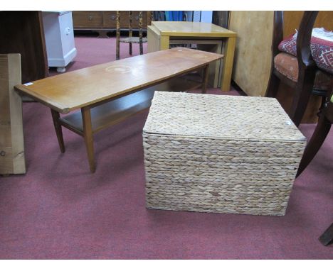 A Vintage Teak Wood Rectangular Shaped Coffee Table, with under shelf,114cm wide, together with a wicker basket. (2)