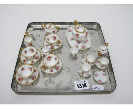 A Miniature Hammersley China Tea Service, tea pot coffee, cream jug etc, with floral decoration.