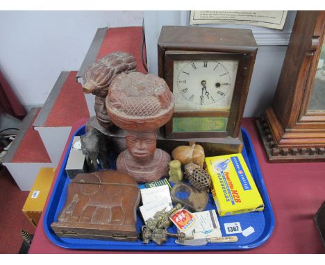 A XIX Century Mantle Clock, pair of Alleyne carved wooden figures, elephant cigarette box, flash bulbs, etc:- One Tray.