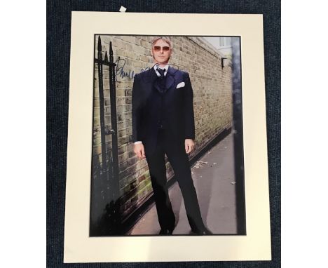 Paul Weller music signed 16 x 12 inch colour photo mounted in cream, superb item. Condition 9/10.