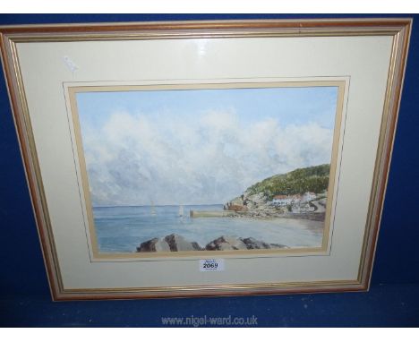 A framed and mounted Watercolour depicting a harbour scene with two sailing boats, cottages to the left, signed lower right R